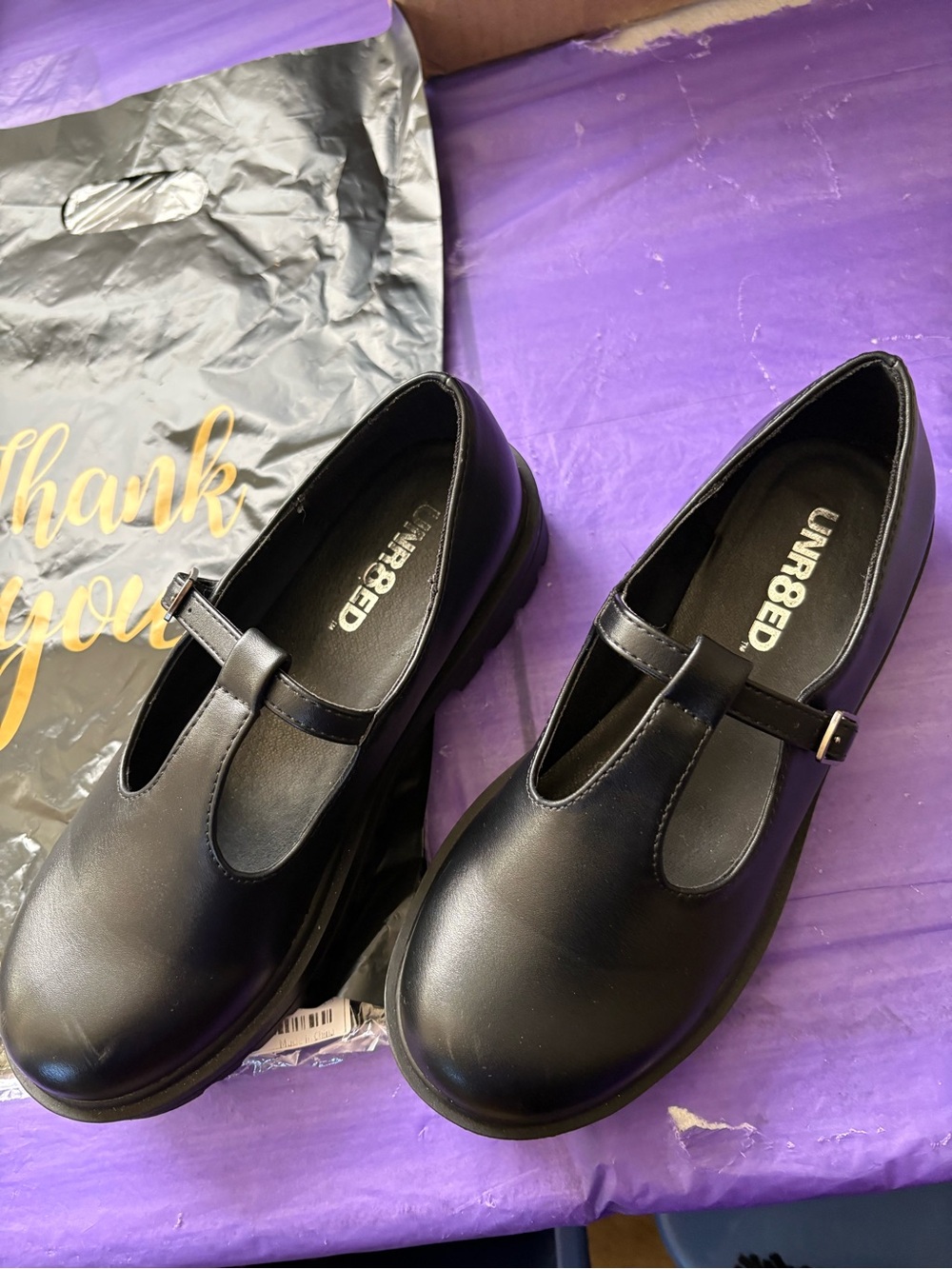 Black leather shoe